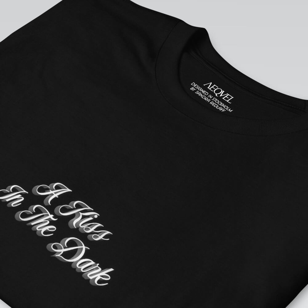 aequel film nour a kiss in the dark t-shirt by sandra redlaff black front details